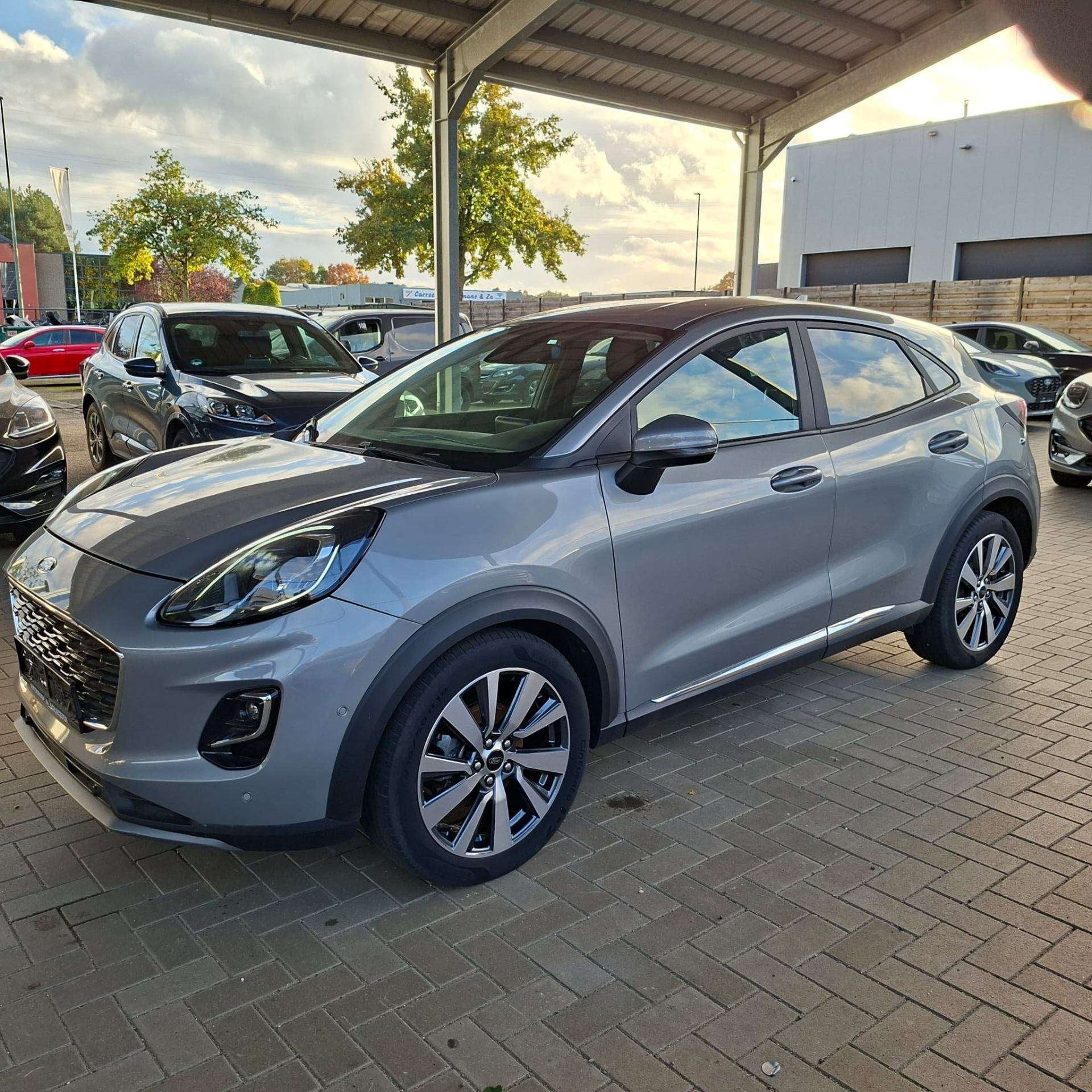 Ford Puma St - Line X 1.0i MHEV Solar Silver (bj 2023), Auto's, Automaat, 5 zetels, 130 g/km, Hybride Elektrisch/Benzine