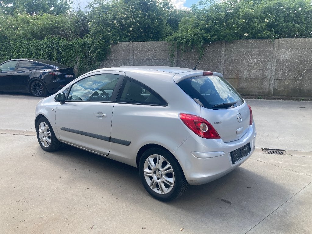 Opel Corsa 1.2 benzine 2010 met 108000km*half-leder*LEZ OK, Auto's, Opel, 4 cilinders, Leder en Stof, Wit, Bedrijf