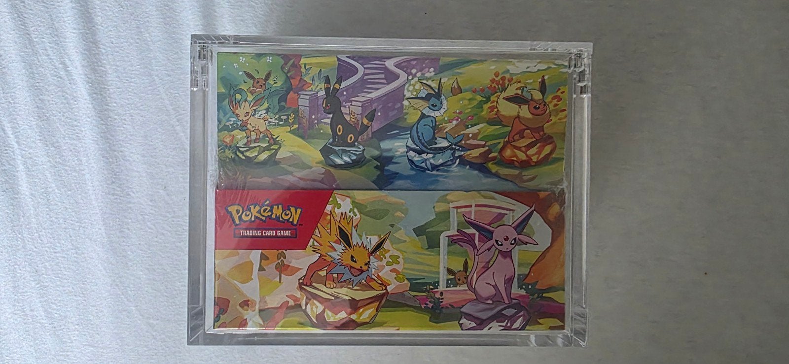 Pokémon Prismatic Evolutions mini tin display, Ophalen