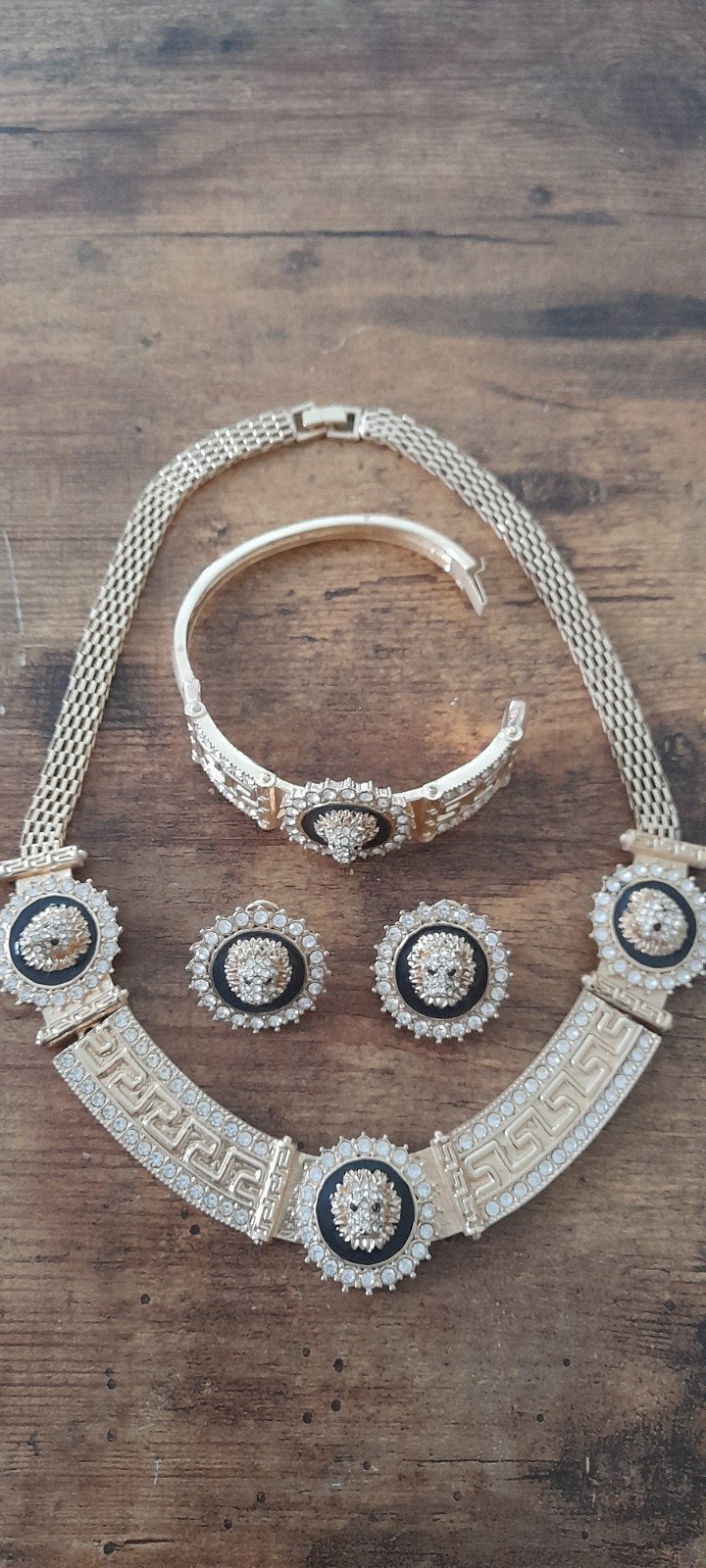 Set met halsketting, armband en oorbel in Cartier-stijl, Ophalen of Verzenden, Goud, Overige materialen