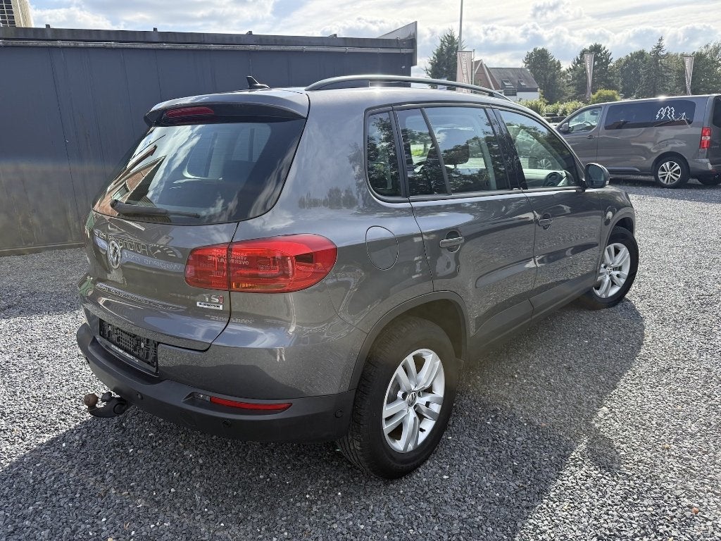 VW Tiguan 1.4i Trendline, 2016, 71.000km, Pano Dak, Navi +, Auto's, Dealer onderhouden, Stof, 4 cilinders, https://public.car-pass.be/vhr/116a170a-9f4f-41f1-a87c-50c055fab628