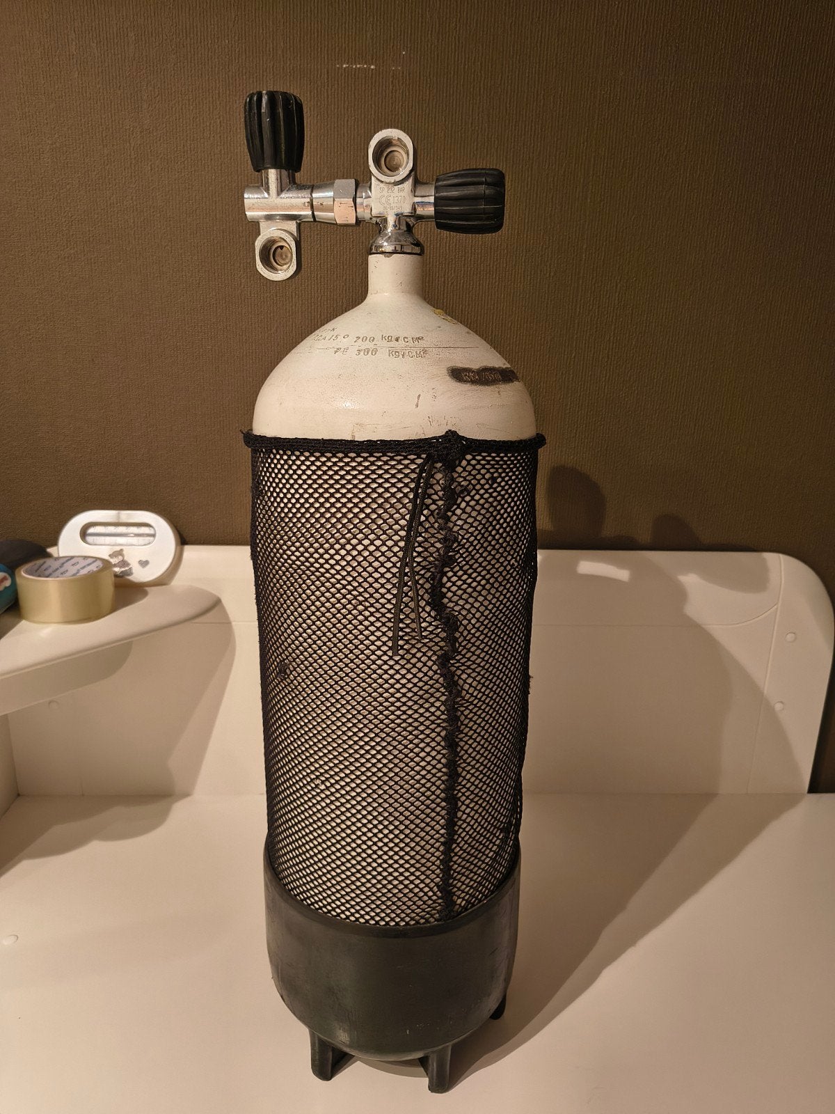 15 liter fles., Ophalen
