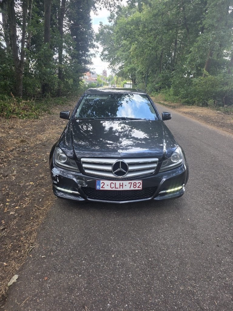 Mercedes C- klasse W204, Auto's, Achterwielaandrijving, Zwart, 5 deurs, Particulier