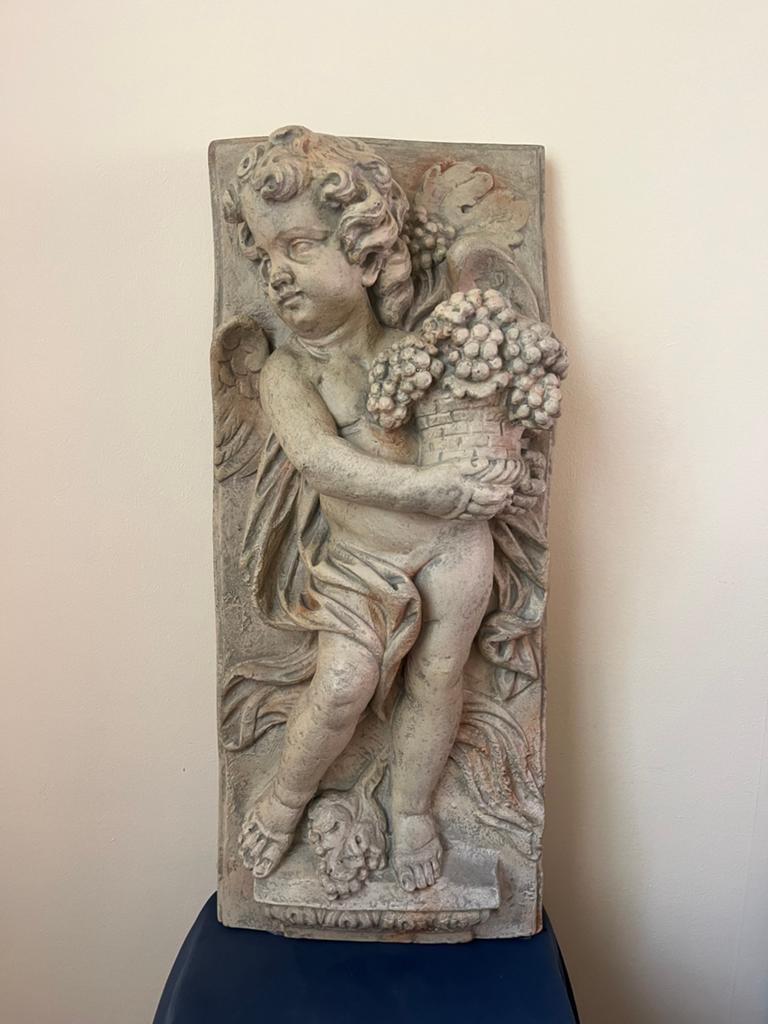 Reliëf putto - klei, Enlèvement