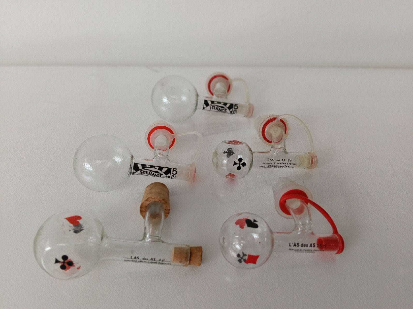 €2 voor 5x doseur, doseerder. 2 cl, 2,5 cl, 4 cl, 2x 5 cl., Enlèvement ou Envoi