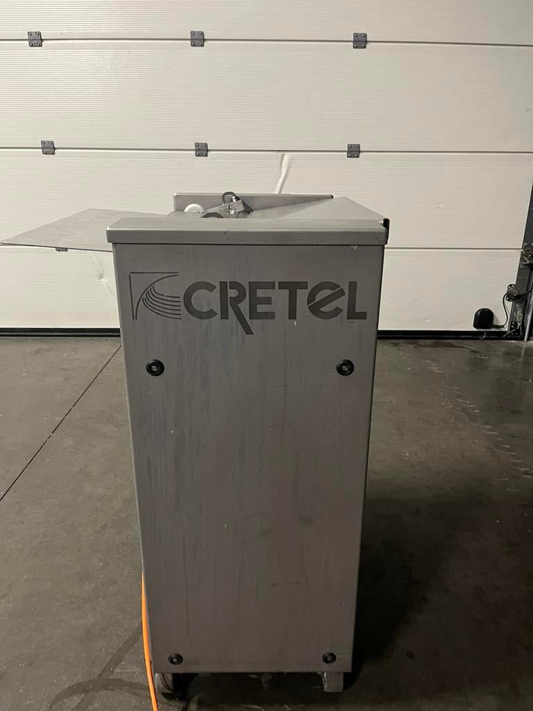 Cretel ontwoerdmachine, Ophalen