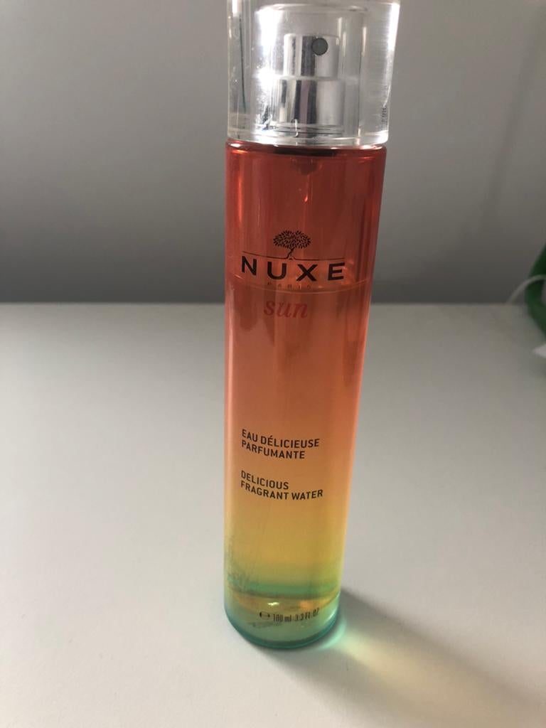 Parfum Nuxe Sun, Handtassen en Accessoires, Uiterlijk | Parfum, Ophalen of Verzenden, Zo goed als nieuw
