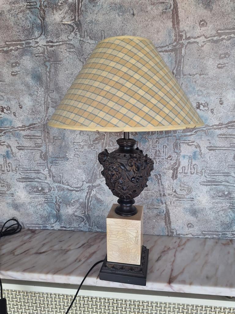 Gietijzer lampendressoir, Ophalen