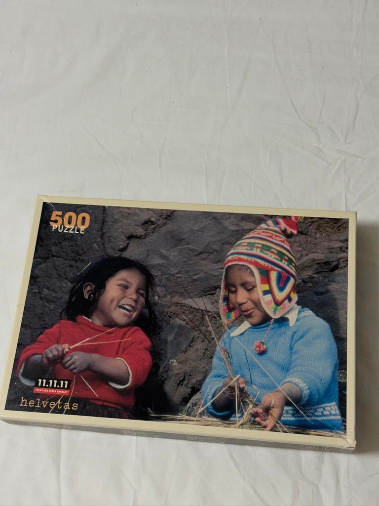 500 puzzle 11.11.11 helvetas - puzzel, Hobby en Vrije tijd, Ophalen of Verzenden, Nieuw
