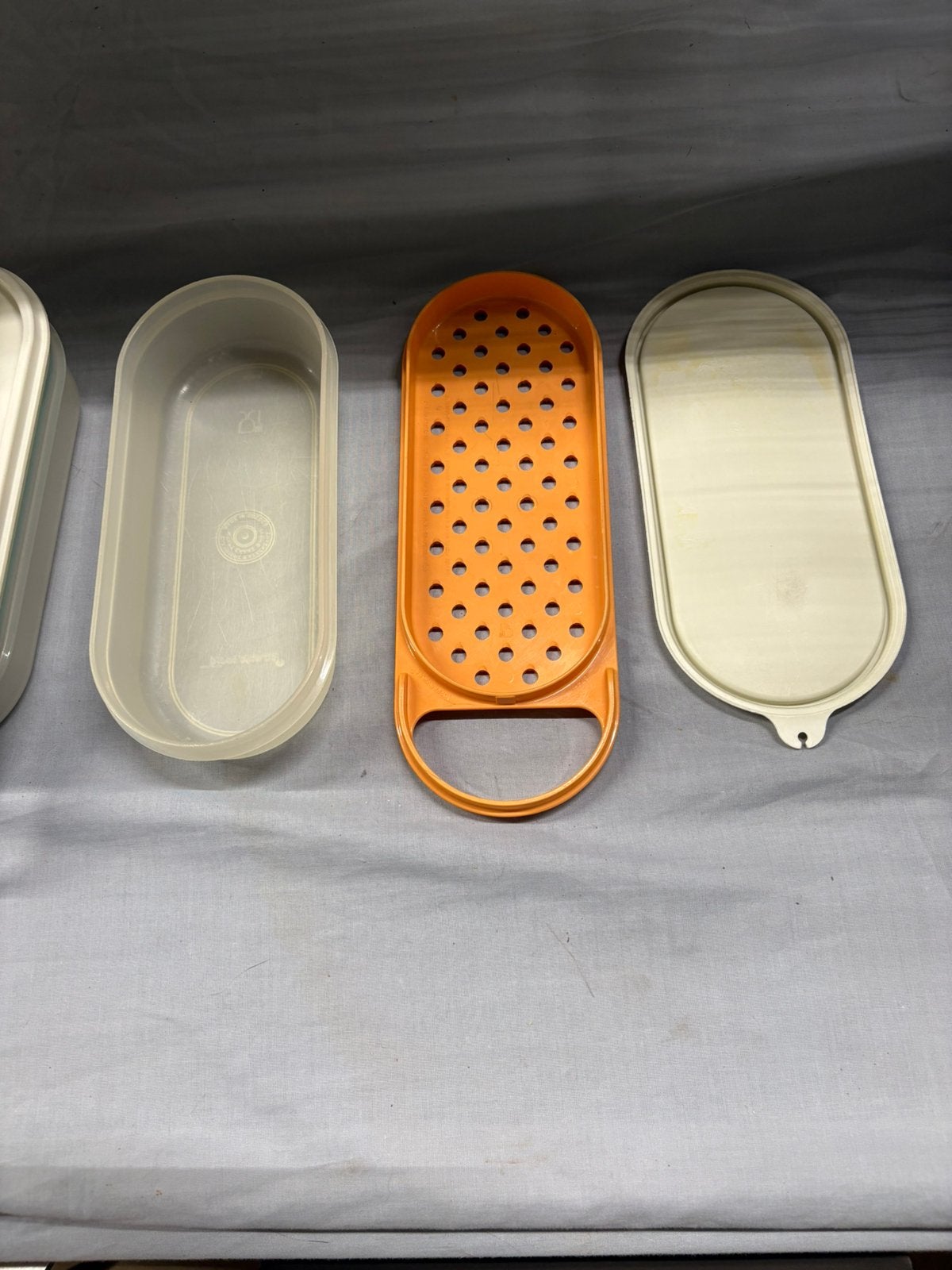 Tupperware raspaartje, Ophalen, Zo goed als nieuw