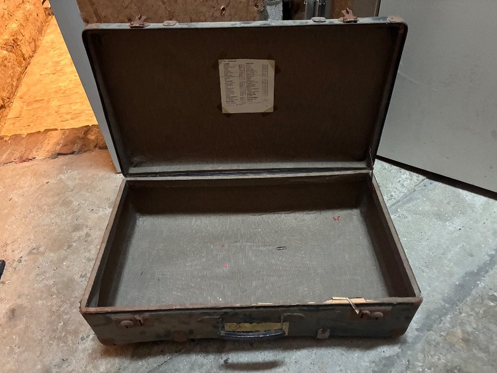 Vintage reiskoffer, Ophalen