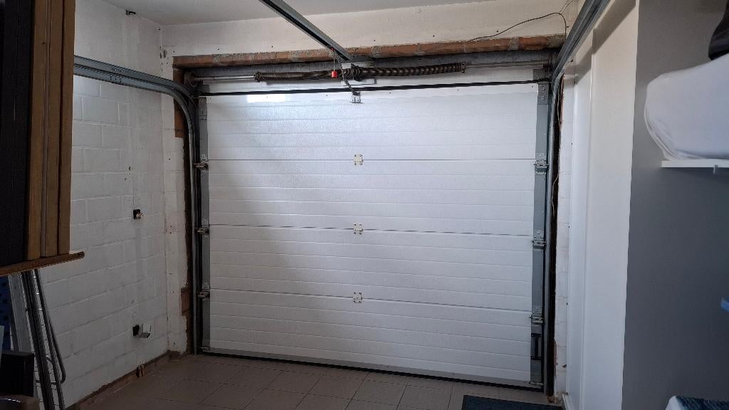 Sectionale garagepoort Winsol, Doe-het-zelf en Bouw, Ophalen, Gebruikt, 120 cm of meer, Garagedeur