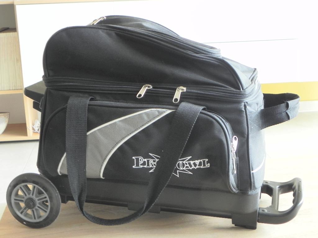 Bowlingbal en caddy, Ophalen, Gebruikt