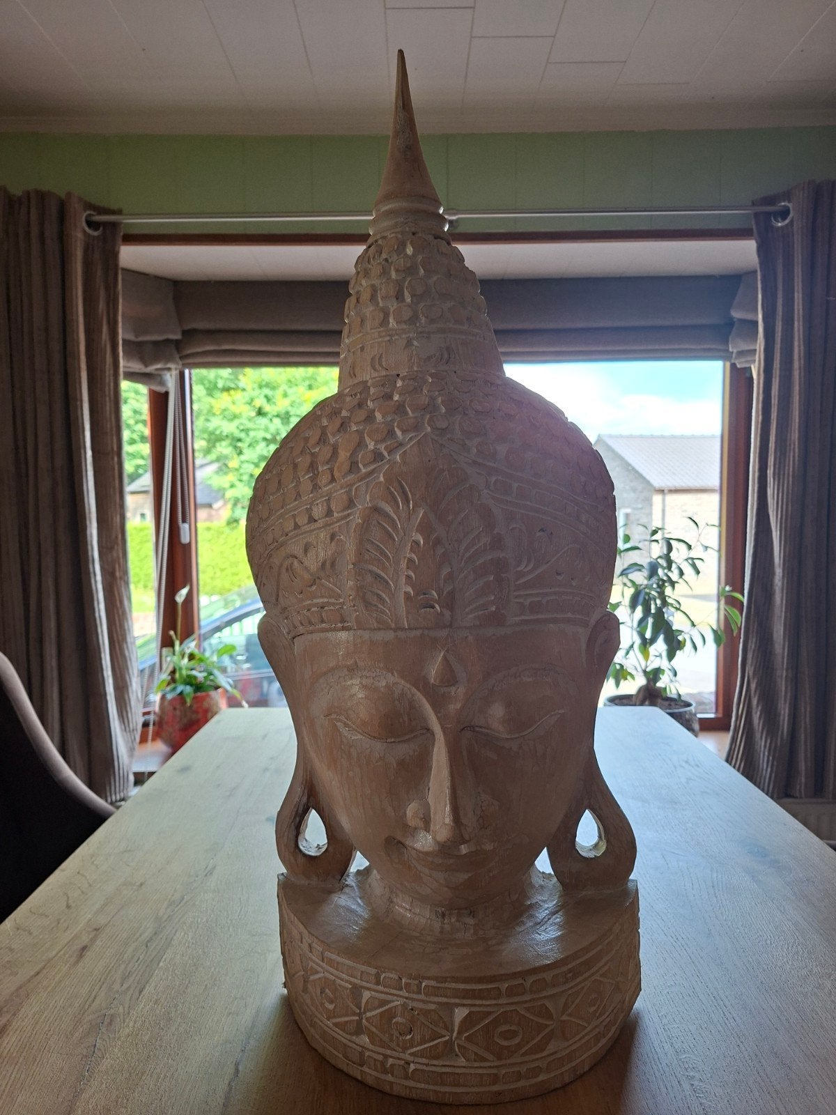 Mooi buddah beeld, Ophalen