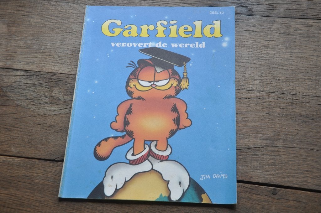 Garfield veroverd de Wereld, Eén stripboek, Ophalen of Verzenden, Gelezen