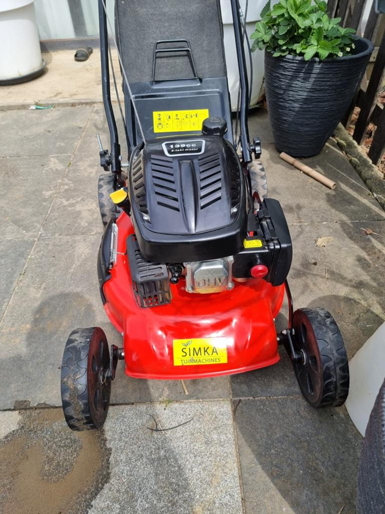 Simka grasmachine, Ophalen