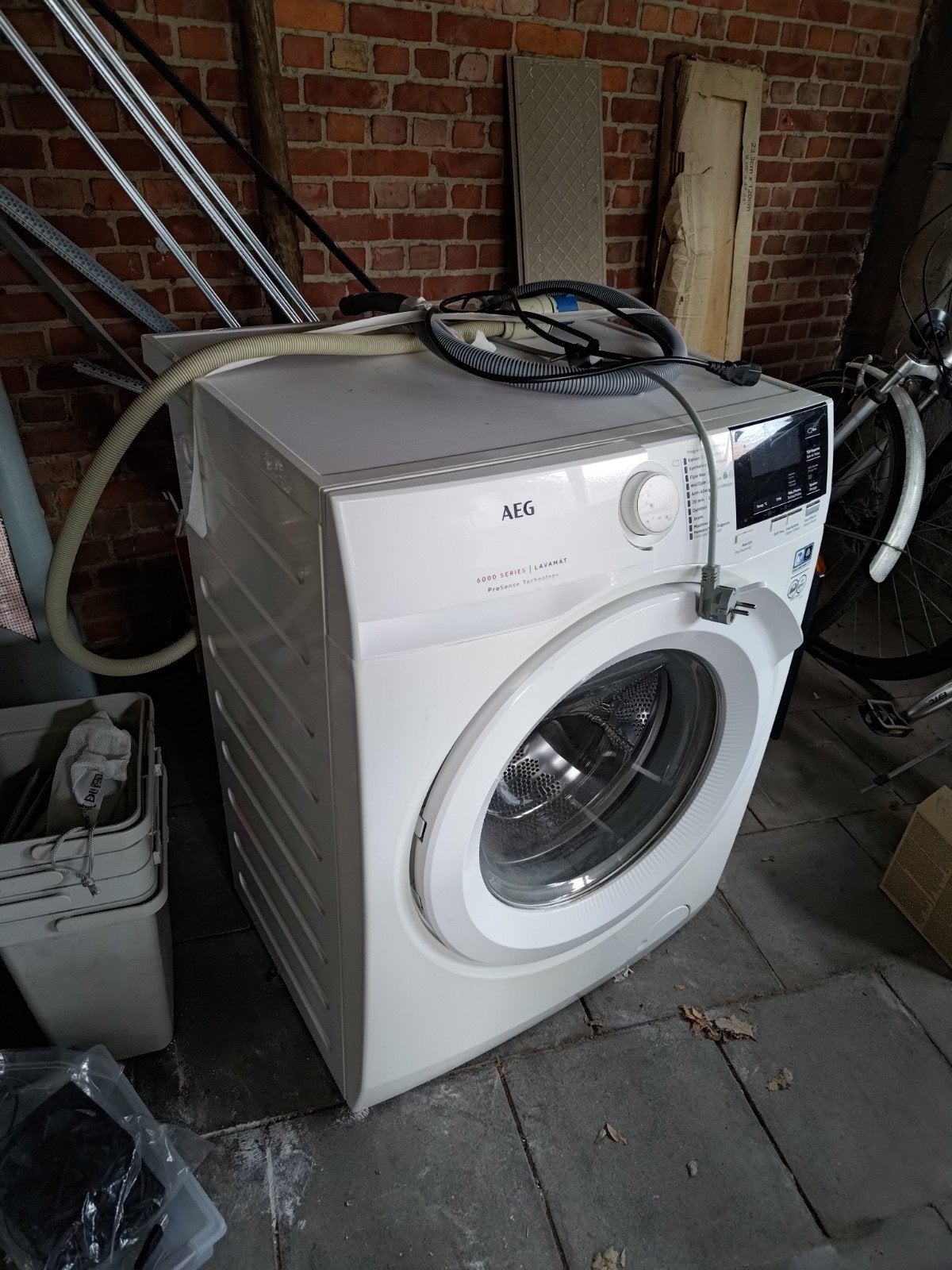 Wasmachine AEG ProSense 7kg, Ophalen, 6 tot 8 kg, Gebruikt, Energieklasse A of zuiniger