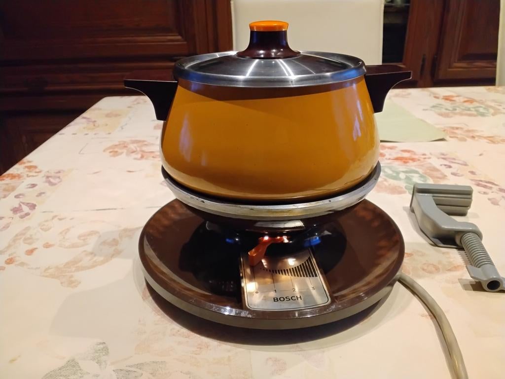 Elektrisch fonduestel, Ophalen, Brander
