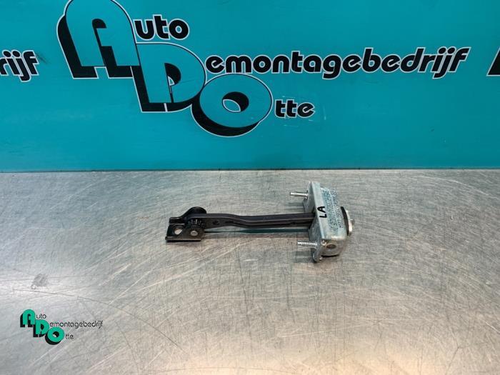Butée 4portes arrière gauche d'un Ford Focus (Focus 04-), -, 3 mois de garantie, -, -