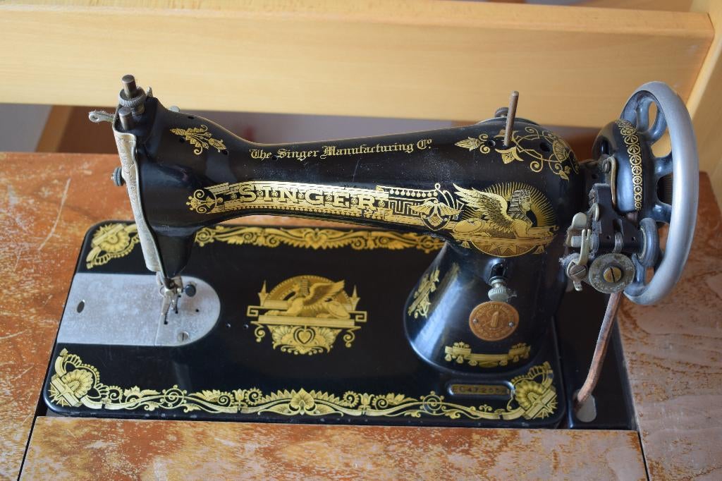 Oude Singer naaimachine, Ophalen