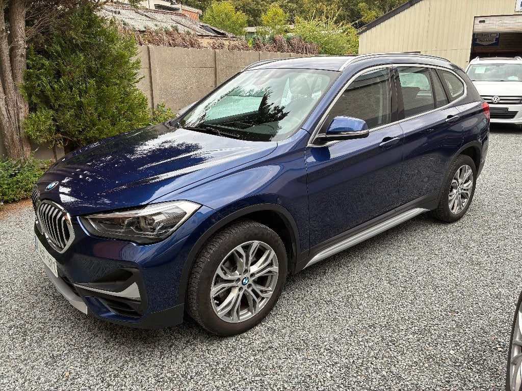 BMW X1 1.5i sDrive18 OPF X-LINE, Blauw, Leder, 5 deurs, Dealer onderhouden