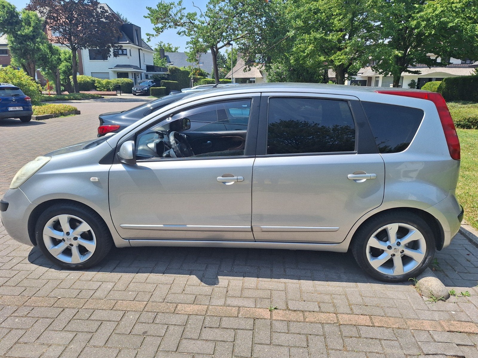 Nissan Note 2007, 1.6 Benzine. Airco, Radio CD player., Auto's, Nissan, Zwart, Leder en Stof, 5 deurs, Particulier