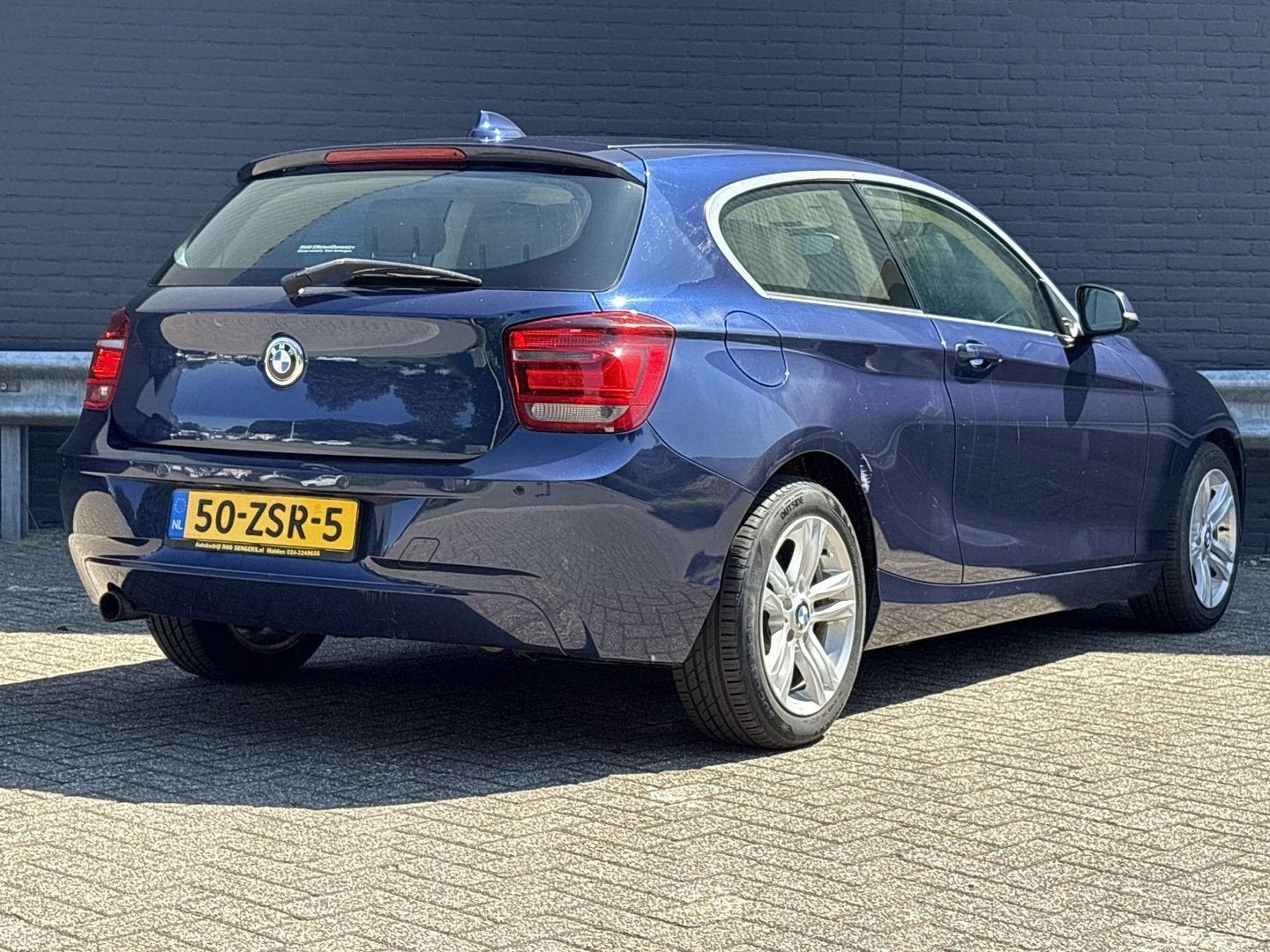 BMW 114 1-serie 114i EDE Business+ | Leder | Climate | Cruis, Auto's, BMW, 1 Reeks, Blauw, 124 g/km, Cruise Control