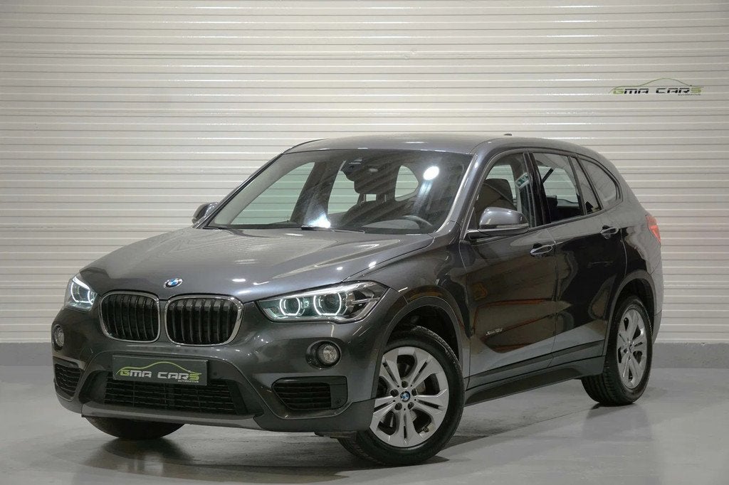 BMW X1 2.0 dA xDrive18 Aut-Navi-Airco-Cam-PDC-Garantie, Auto's, BMW, Stof, 4 cilinders, 124 g/km, Bedrijf