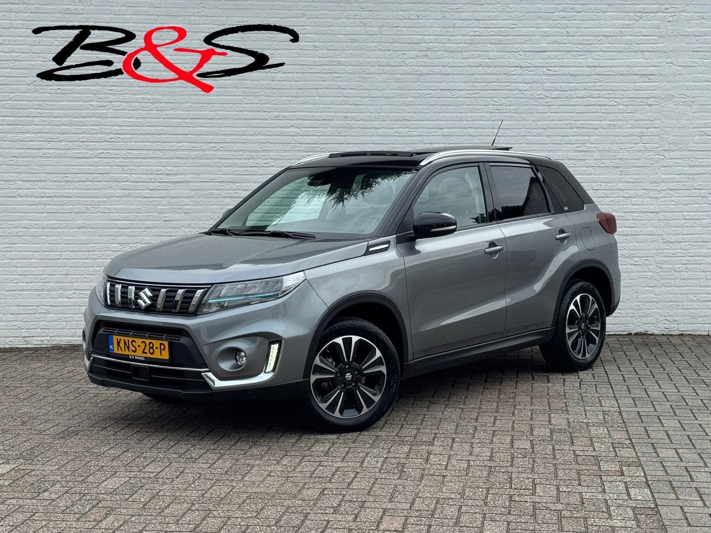 Suzuki Vitara 1.5 Hybrid Style AllGrip Comfort + Automaat Pa, Auto's, Suzuki, Automaat, Bedrijf, Grijs, Hybride Elektrisch/Benzine