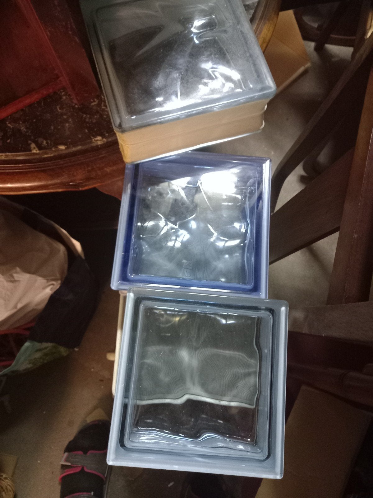 3 bloc en verre, Ophalen