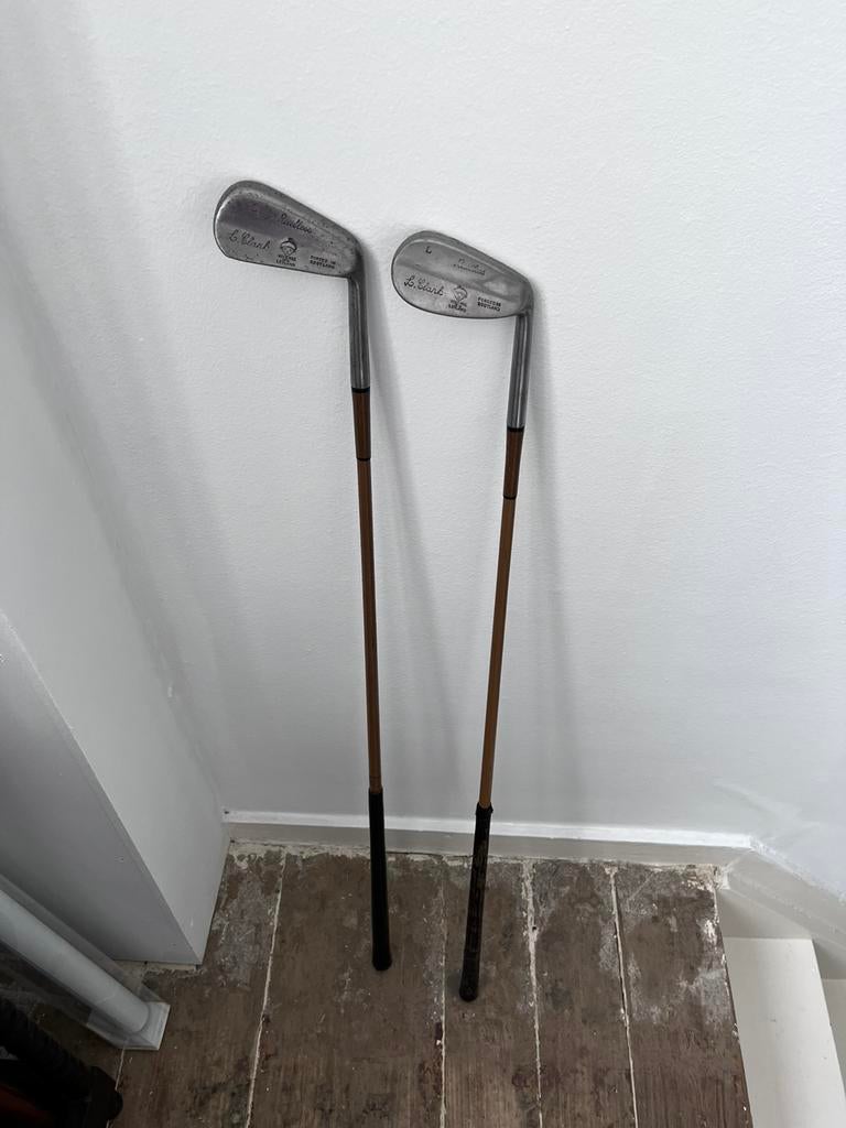 Golfstokken en paraplubak, Ophalen