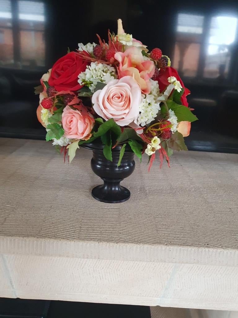 Zijden bloemstukje, Ophalen