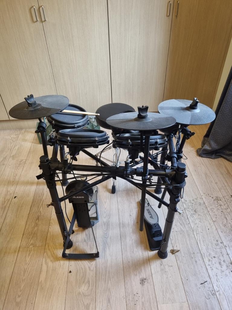 Mooi start drumstell van alesis, Ophalen