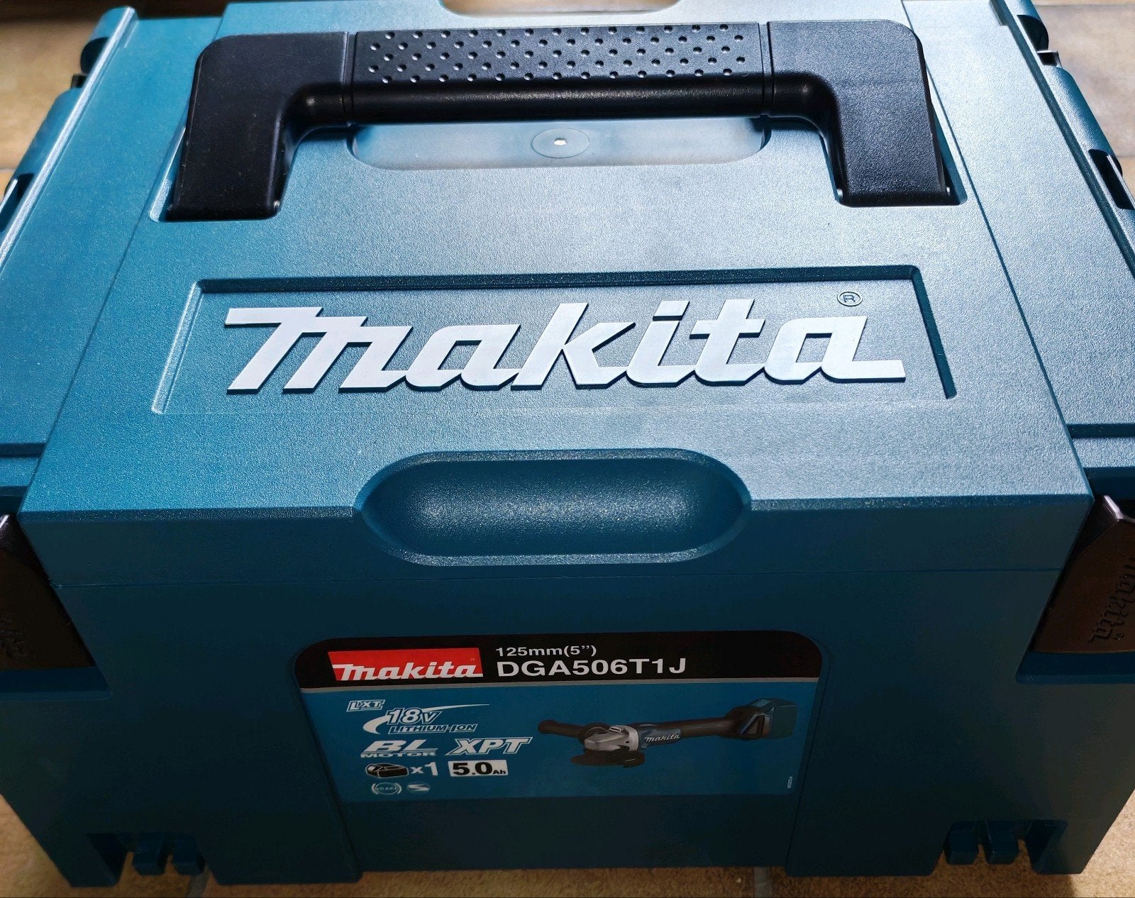Haakse Slijper Makita DGA506T1J, Ophalen