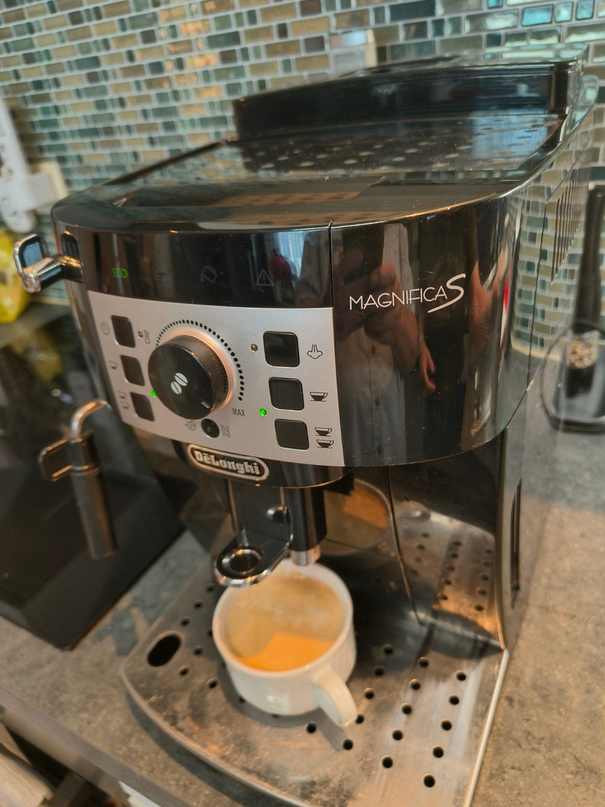 Delonghi koffie machine werkt met koffie bonen, Ophalen