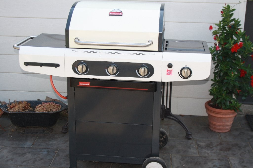 gas barbecue met 4 pitten, in zeer goede staat met hoes, Tuin en Terras, Ophalen