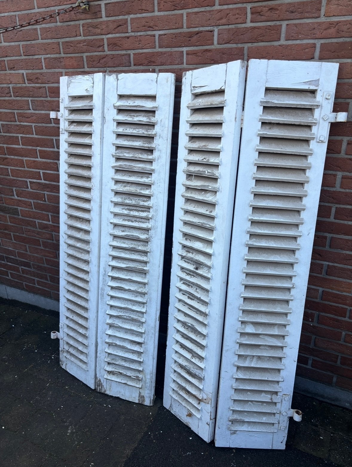 Antieke decoratie luiken, Ophalen