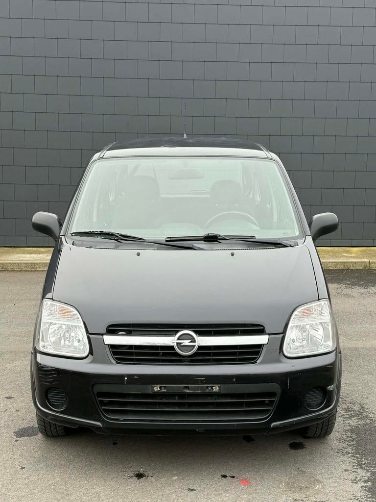 Propere Opel Agila te koop!, Auto's, Voorwielaandrijving, Stof, Zwart, Zwart