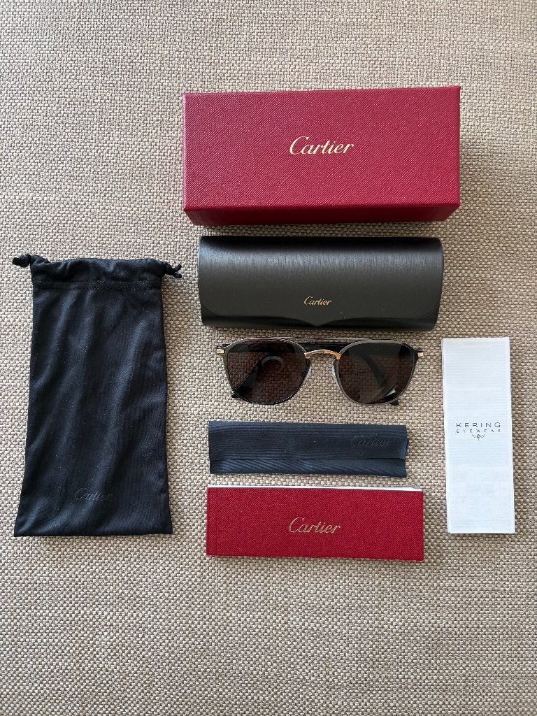 Cartier Zonnebril Signature C, Ophalen, Zo goed als nieuw, Zonnebril