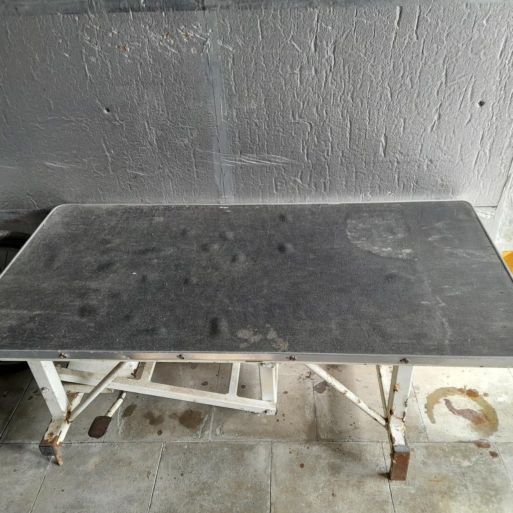 Trimtafel verstelbaar, Ophalen