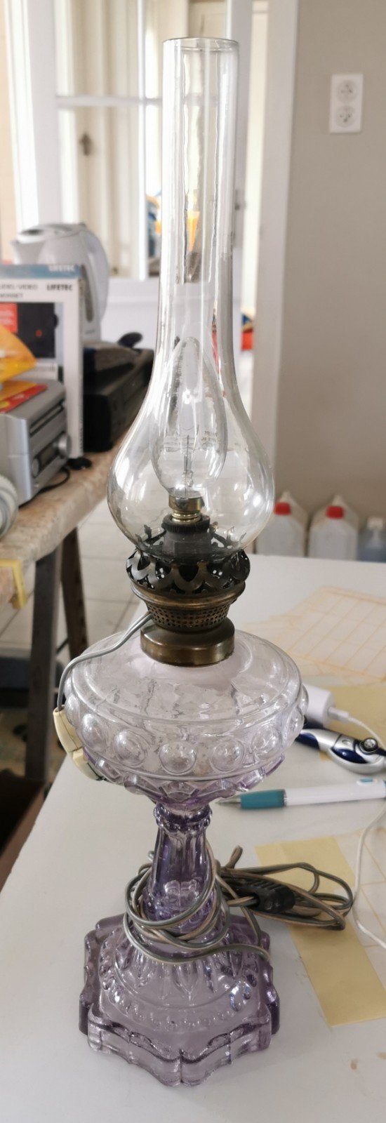 Glazen lamps amethist, Ophalen