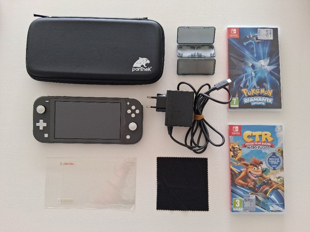 Nintendo Switch Lite Grijs + 2 Games + Beschermhoes, Consoles de jeu & Jeux vidéo, Enlèvement, Gris, Comme neuf, Avec housse de protection ou sac