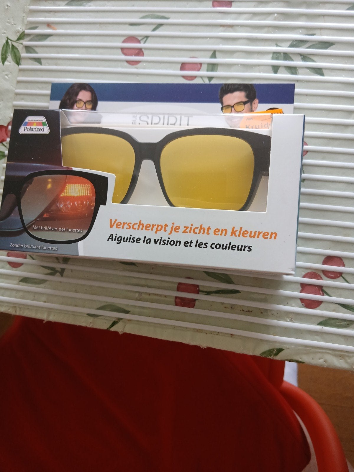 Zonnebril  nog nieuwe is over ander bril  zeten, Ophalen