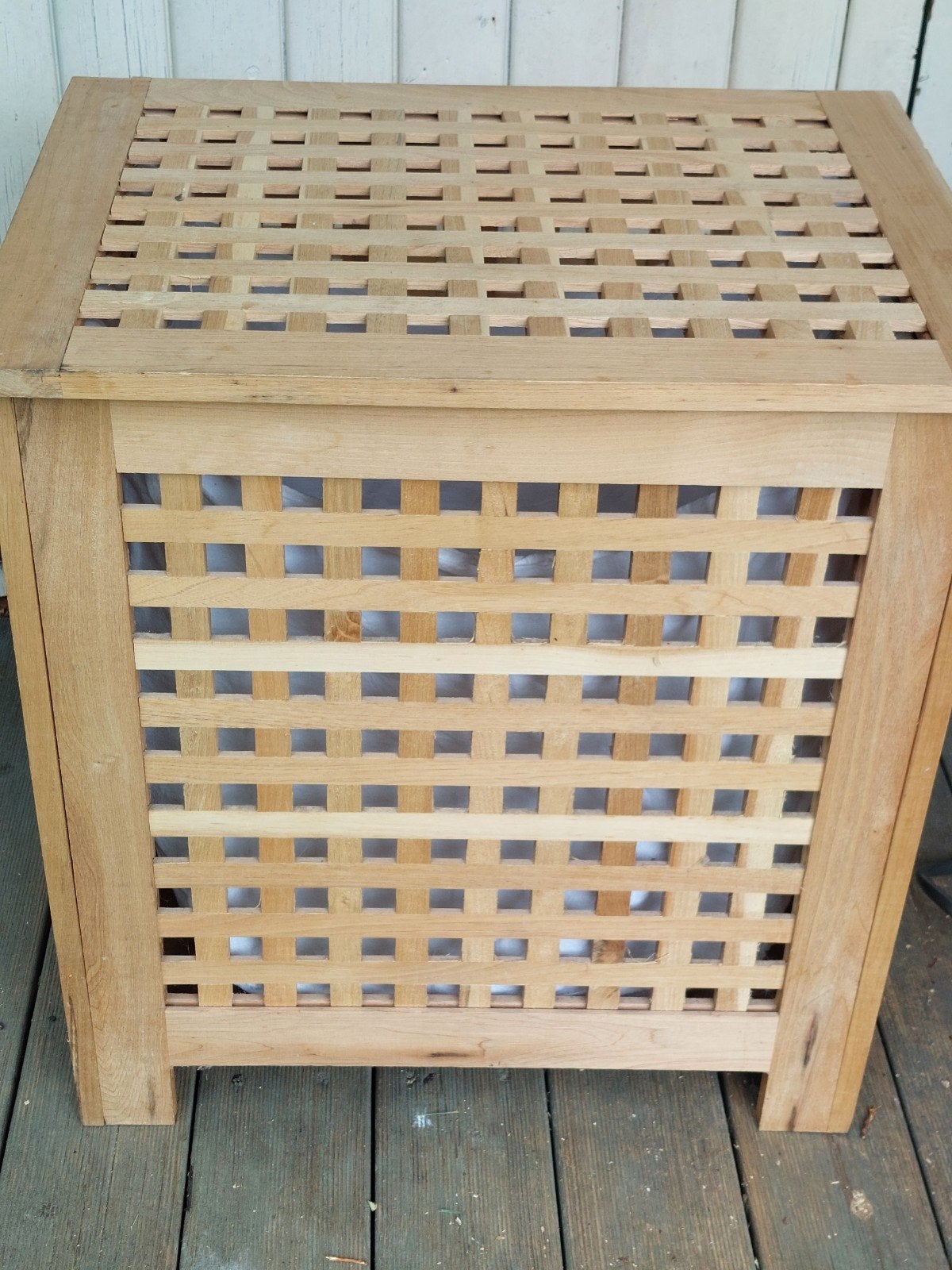Houten wasmand, Ophalen
