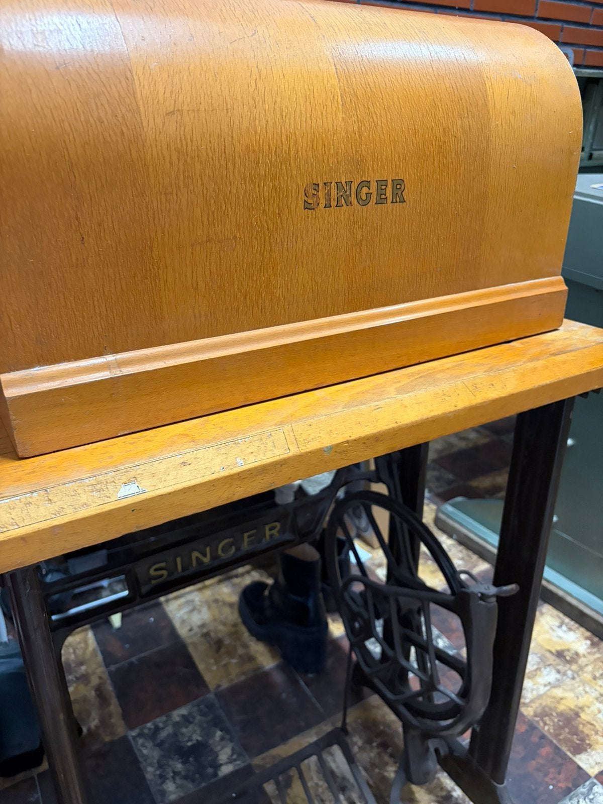 Machine a coudre SINGER, Ophalen