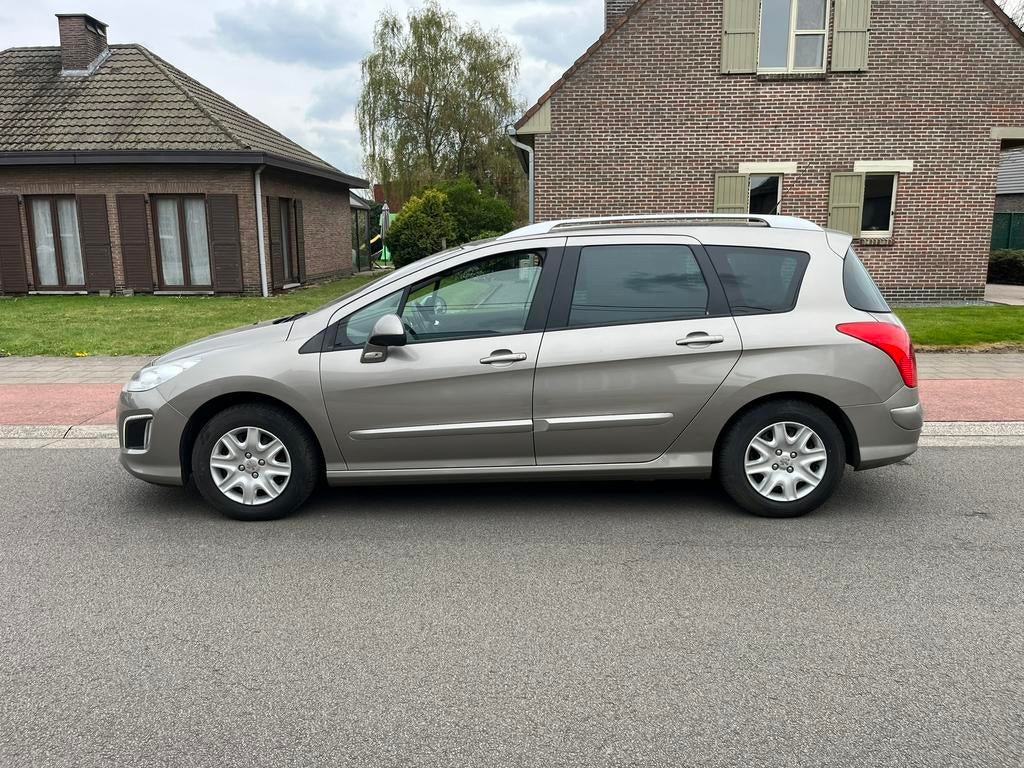Peugeot 308 sw 1.6 hdi 72000 km 5 zits+2 zits 04/2013, Euro 5, 4 cilinders, Parkeersensor, 7 zetels