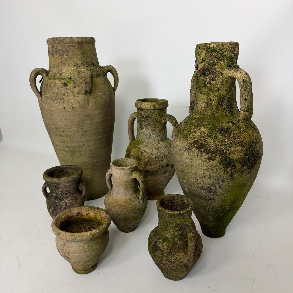 Carafes de jardin en faïence patinée, Enlèvement