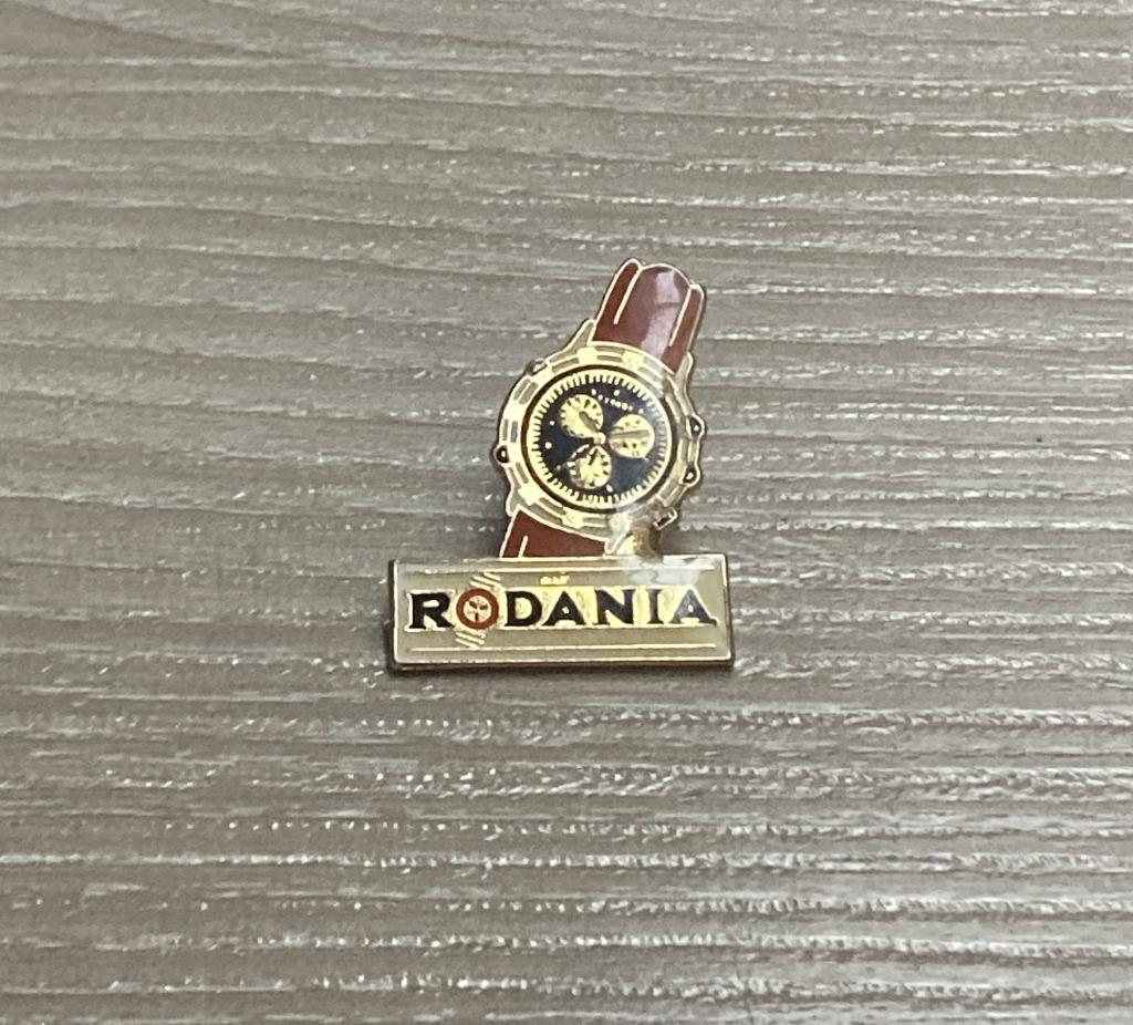 PIN - RODANIA - UURWERK - HORLOGE, Verzenden, Gebruikt, Merk, Speldje of Pin