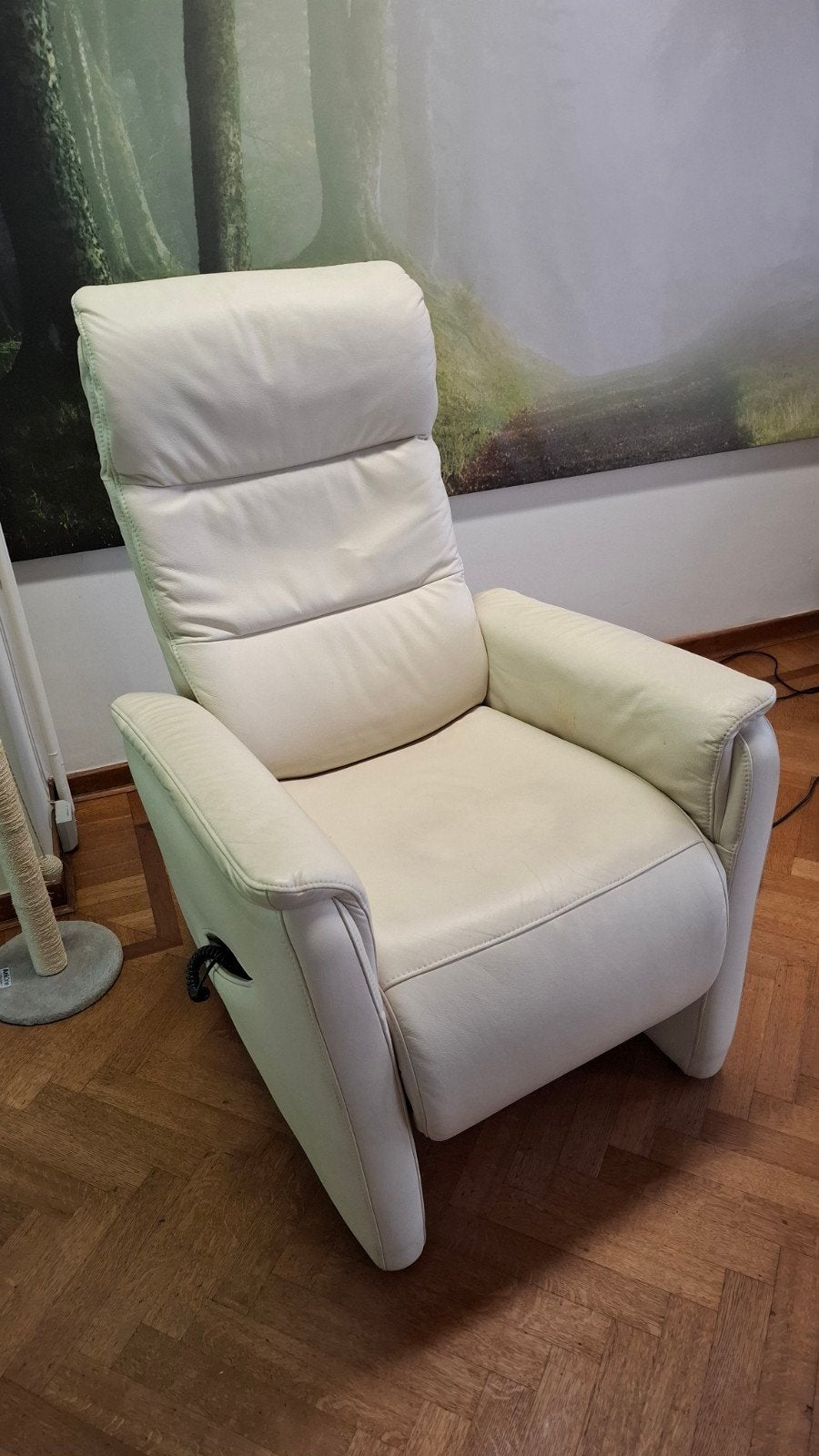 Elektrische lederen fauteuil, Ophalen