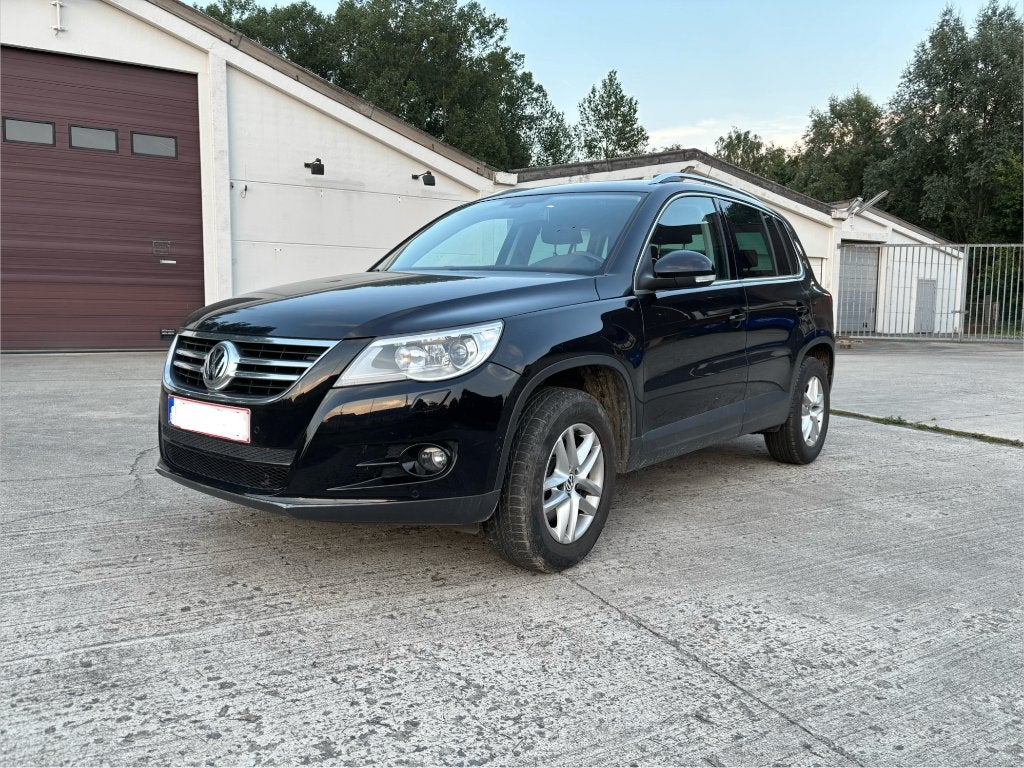 Volkswagen Tiguan 2.0 TDI Sport 4Motion Automaat | 76.800 km, Auto's, Volkswagen, Zwart, 4 cilinders, Zwart, Leder